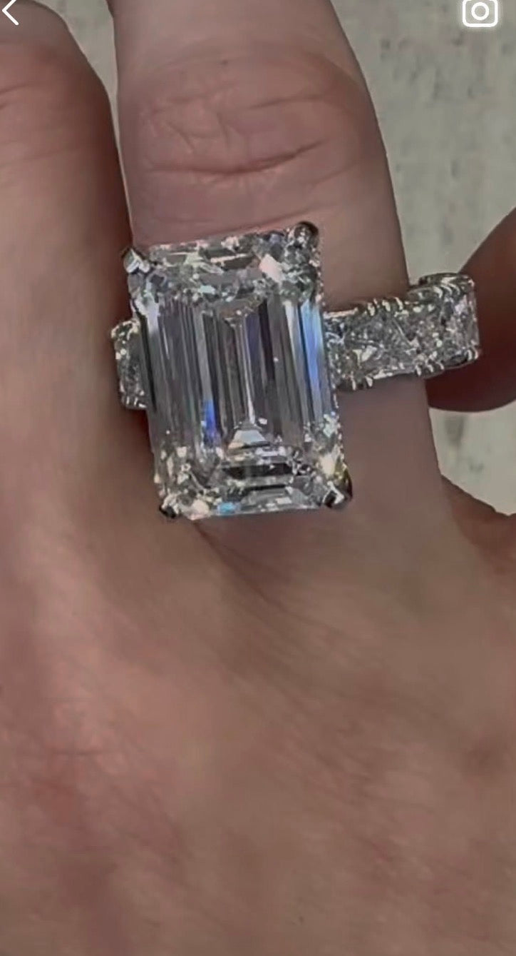 Emerald triangle engagement ring