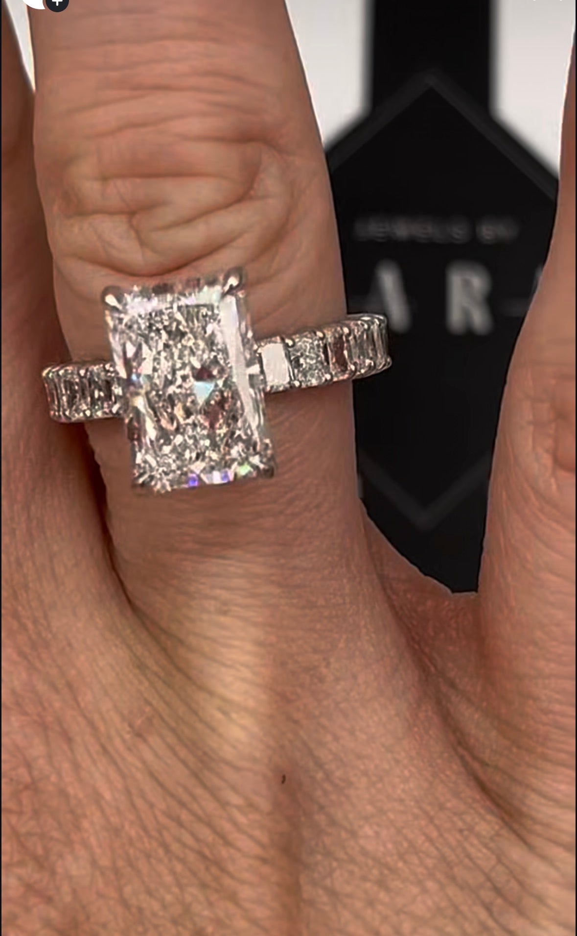 Radiant engagement ring