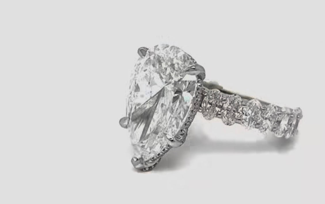 Custom Oval/pear diamond engagement ring